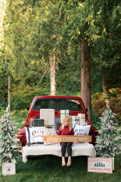 boy-smiling-with-christmas-tree