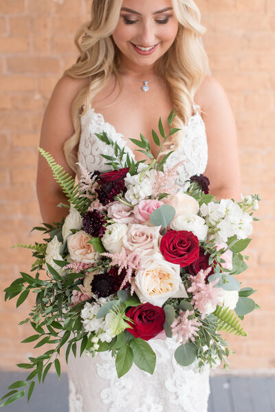 Bridal bouquet of pink and red floral bouquet