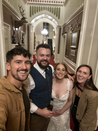 Amy & Nick posing with couple