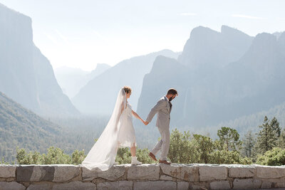 A bride kisses her groom in Yosemite National Park.