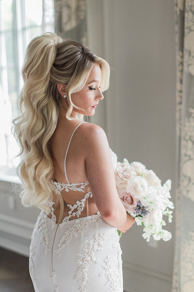 Choose the best bridal updo in Philadelphia, crafted with a chic and sophisticated touch.