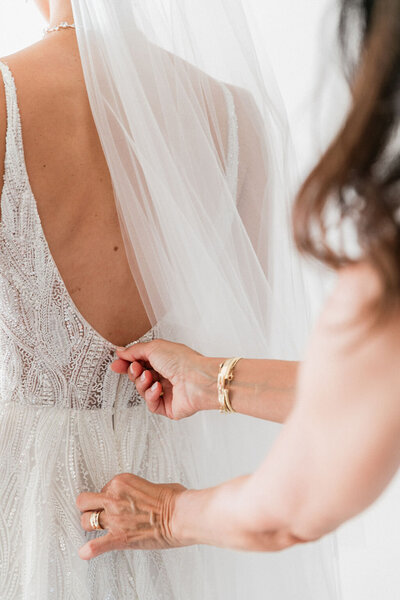 Elegant bridal preparation moment captured in soft light, styled by a destination wedding planner in Greece.