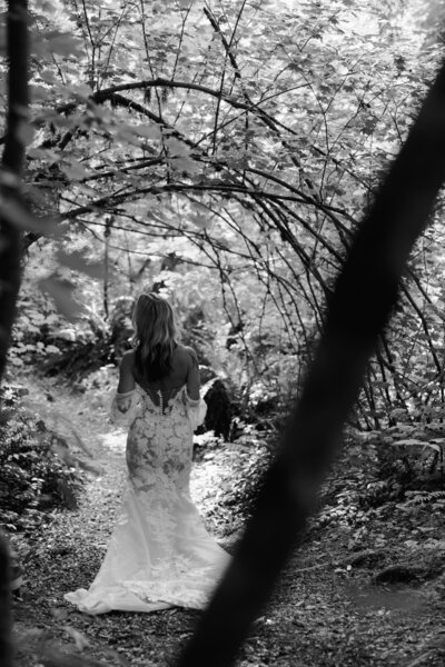 bride and groom hugging under tree