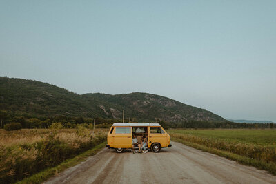 yellow van on dirt road