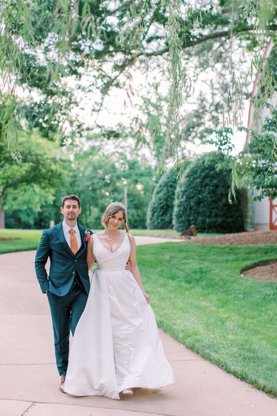 Bride and groom walk up memorial steps at their DC wedding