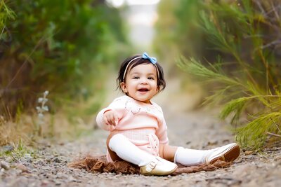 baby girl posing in a field at Mission Trails