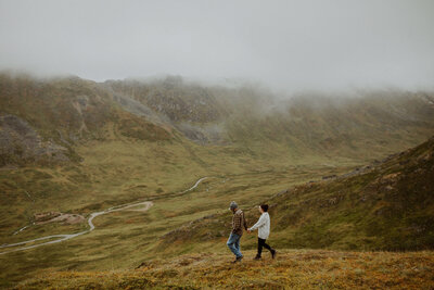 Couple walks together at Hatcher's Pass in Alaska