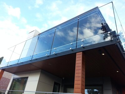 Luxury  frameless glass railing for safety and increases value to your home