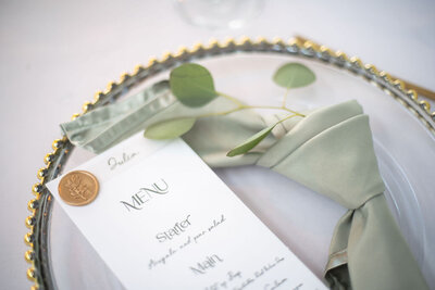 Wedding menu with wax seal and name tag