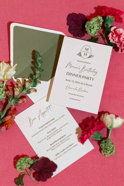 Custom wedding invitations, green letterpress with pink background, pink fresh flowers surrounding