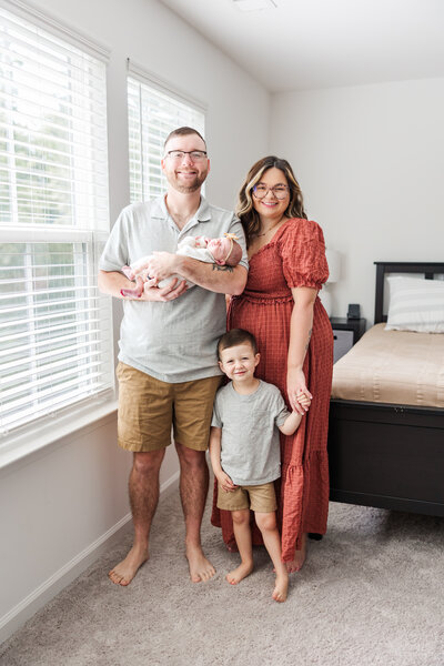 family in their house during lifestyle newborn session in Charleston South Carolina