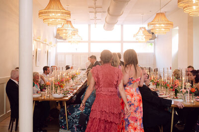 Groom and his groomsmen getting ready at the Quirk Hotel in Richmond, Virginia—captured in a candid, editorial-style moment by Editorial Wedding Co.