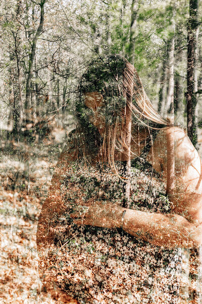A mother-to-be captured in Krop Kreative's signature multiple exposure style during a woodsy maternity session—Lake Geneva lifestyle photography.