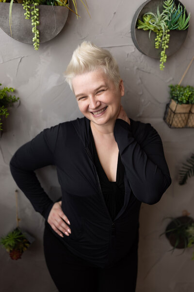 Photo of Jessie, owner and founder of Stories Untold Studio, a Boudiour Photographer