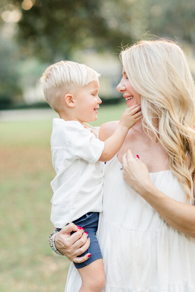 mom and son smiling at each other on film by Orlando family photographer