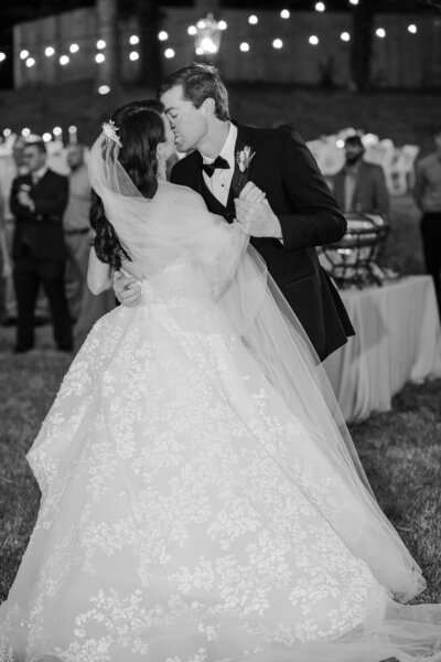 Black and white groom and bride first dance
