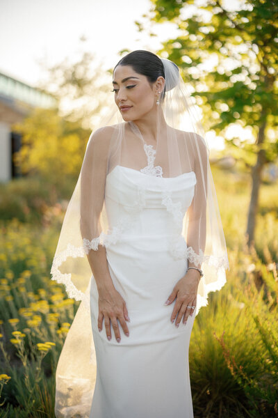 Bride in wedding dress with groom walking down aisle