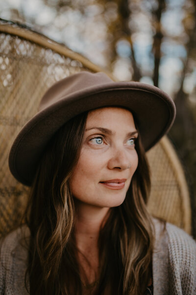 Kristin Lathrop in a brown brimmed hat.