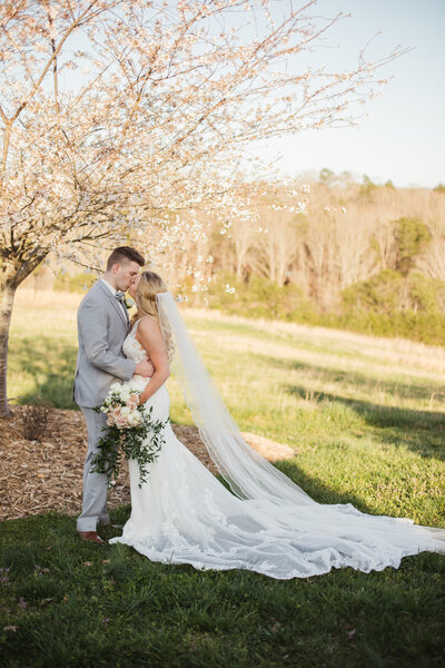 couple cuddling together during engagement session