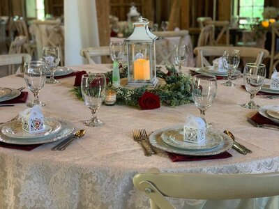 A table set for a wedding in the Country Strong barn