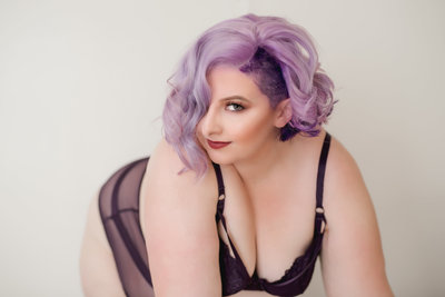 Natural light boudoir with purple hair