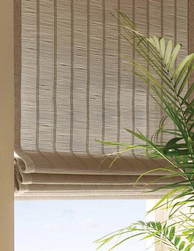Roman shades with natural textures in sunlight