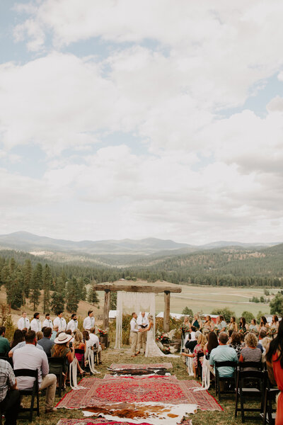 Bride & Groom Mountain Forest View Wedding Ceremony - Logan & Chris | Schmidt Cattle Ranch Spokane Washington Wedding