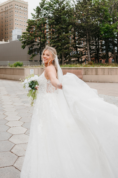 Your go-with-the-flow Minnesota wedding photographer. Real laughs, big love, and true-to-life photos — because forever should feel fun.