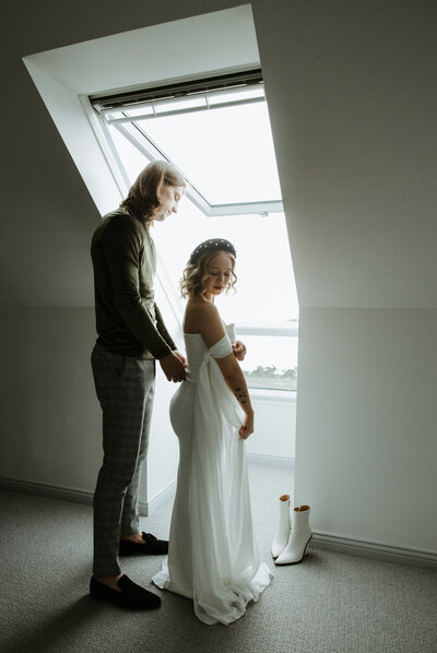 bride and groom getting ready for elopement in Scotland