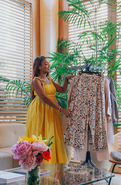 Beautiful lily floral arrangement in an upscale paper shopping bag