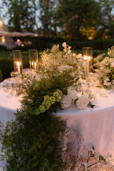 lilac and blue centerpiece  on a wedding table