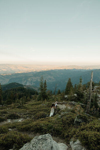 Elopement couple at viewpoint in the Enchantments view of Snow Lakes in Washington