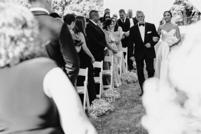 bride and groom walking up steps at Emerson Park Pavillion