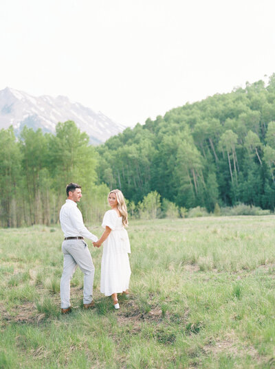 Portrait of bride and groom during engagement portraits at Golden Gate Canyon State Park in CO.
