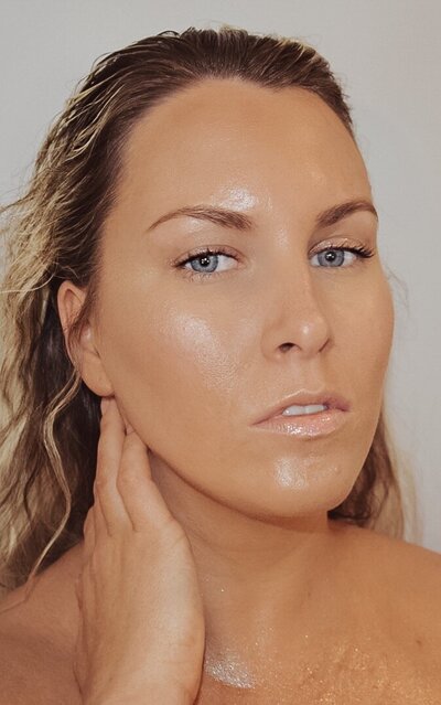 Woman with gorgeous, glowing, dewy skin
