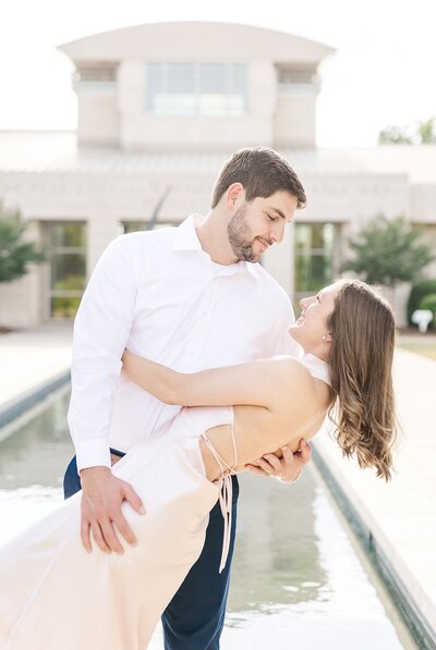 Engaged couple in front of Jule Collins Smith Museum | Birmingham engagement photographer Amanda Horne