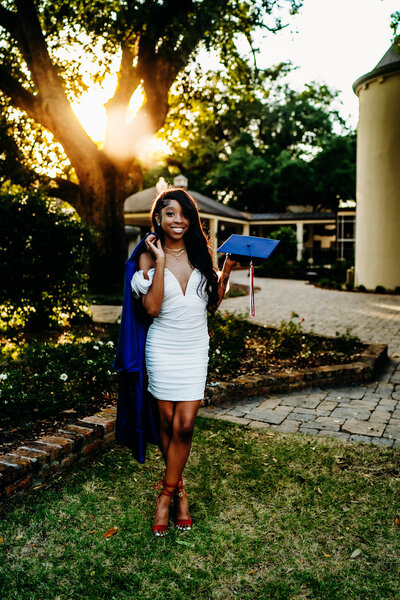graduation photo with son at parc de Lafayette, louisiana