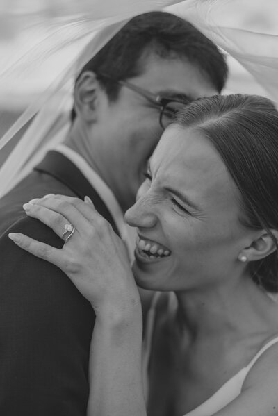 Northern Virginia wedding couple kissing walking down sidewalk