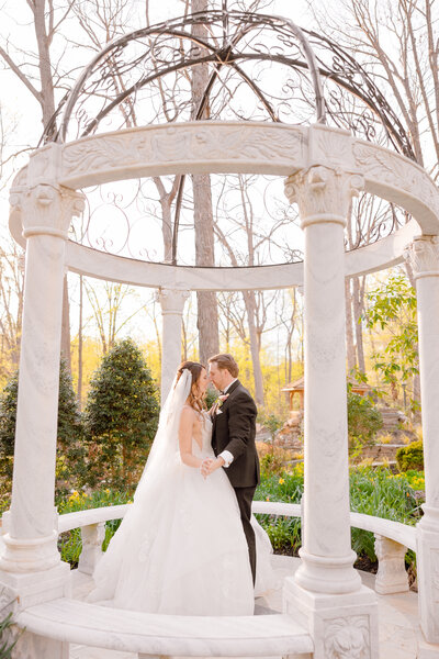 A Bride and groom share a romantic summer fairytale garden wedding at Gramercy Mansion for Gramercy Mansion Wedding Photographer