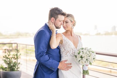 Bride and groom kissing