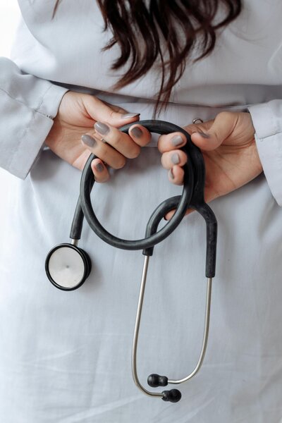 doctor holding stethoscope