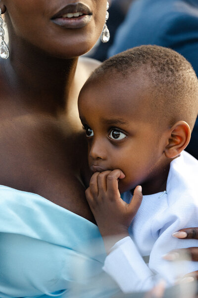 A child and his mother during a wedding at Aquatopia Water Conservatory, Ottawa.