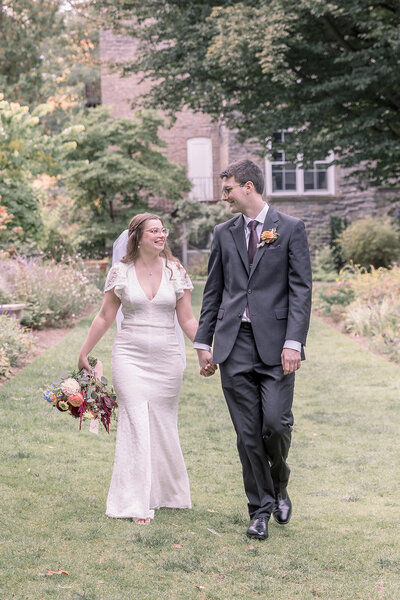 Detroit Michigan wedding couple walking holding hands