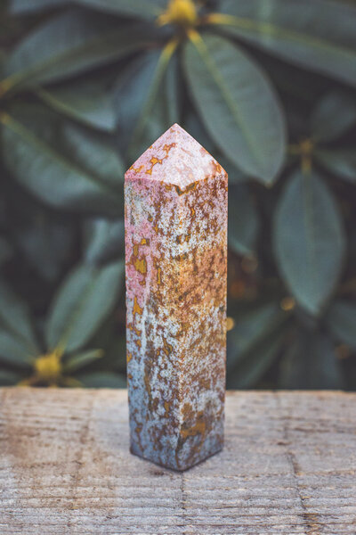 Pink and gold ocean jasper tower crystal.