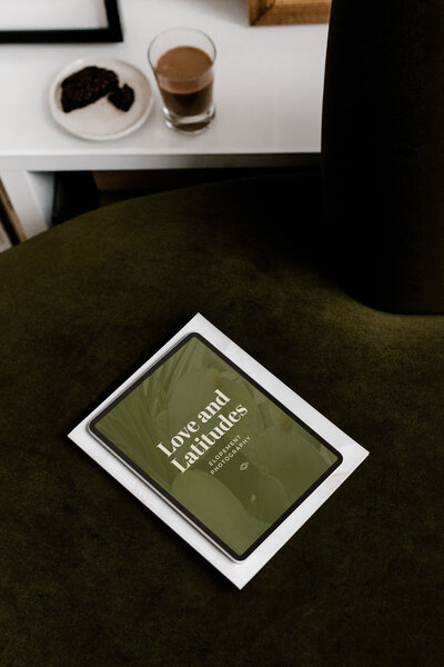 iPad with a logo for Love and Latitudes pulled up.