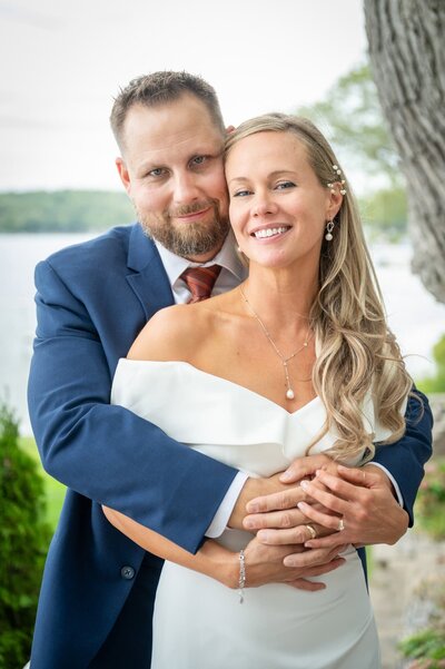 wedding couple holding each other