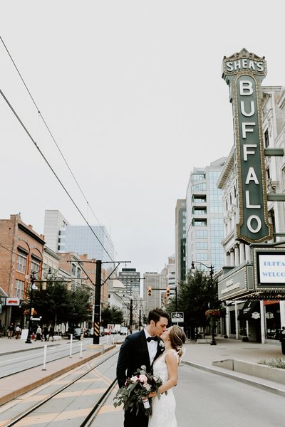 Bride and groom walk up memorial steps at their DC wedding