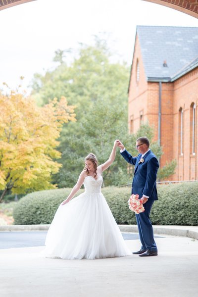 Bride and groom walk up memorial steps at their DC wedding