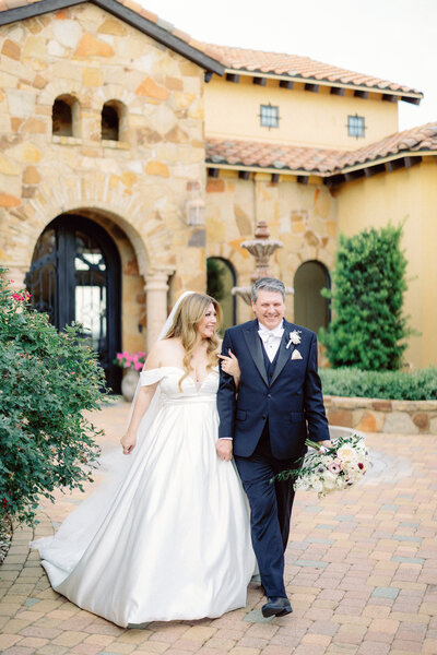 bride and groom embracing