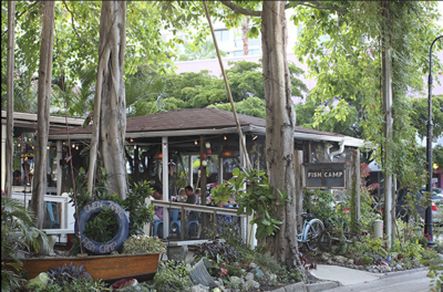 sarasota florida locals enjoy owens fish camp restaurant in burns court.
